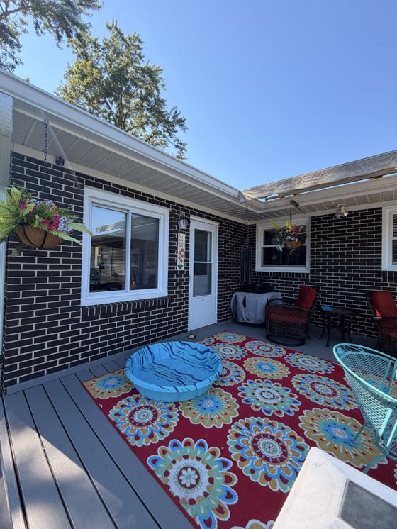 Clean patio windows reflecting a clear blue sky